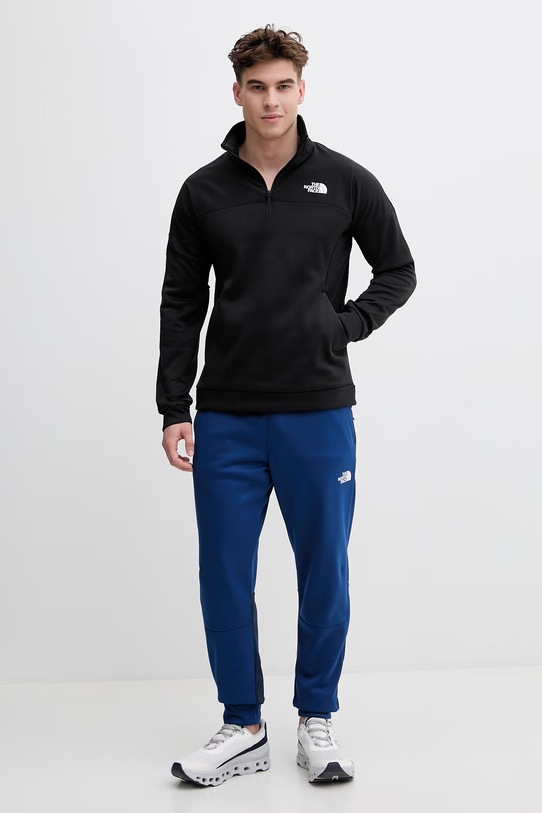 The North Face spodnie dresowe męskie MOUNTAIN ATHLETICS FLEECE NF0A893S8Z41 granatowy SS26