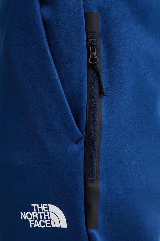 The North Face spodnie dresowe męskie MOUNTAIN ATHLETICS FLEECE granatowy NF0A893S8Z41