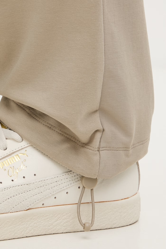 Guess spodnie dresowe męskie GUSTAVE Z6GB01.K2834 beżowy