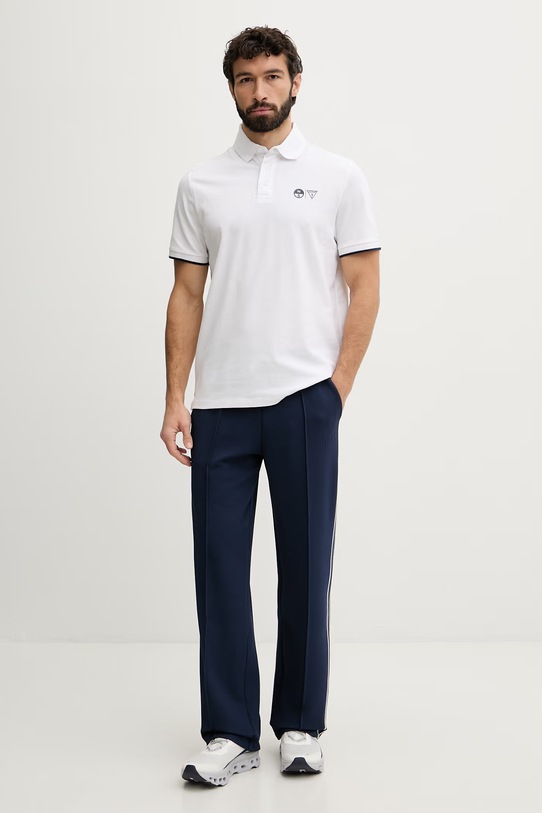 Guess spodnie dresowe męskie SPIROS Z6GB14.K3211 granatowy SS26