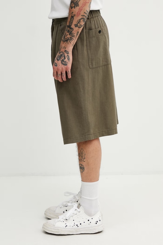 Undercover szorty z lnem męskie UP1F4503 zielony SS26