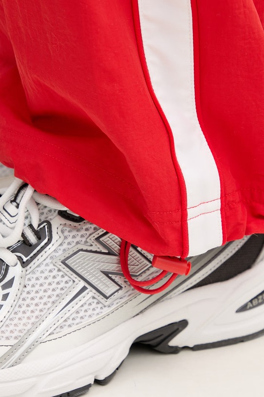 Puma spodnie dresowe Oversized 629594 czerwony