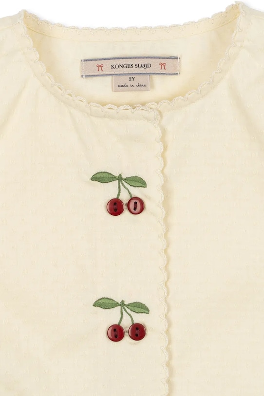 Dziewczynka Konges Sløjd sukienka bawełniana dziecięca EVIA CHERRY DRESS GOTS KS104794.PPY2 beżowy