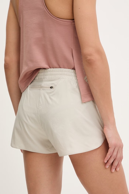Odzież adidas by Stella McCartney szorty sportowe damskie JY8200 beżowy