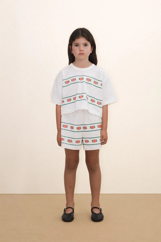 Tinycottons szorty bawełniane dziecięce ROSES SHORTS wzorzyste biały SS26.074