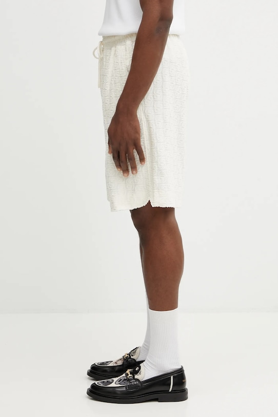 Bavlněné šortky Drôle de Monsieur Monogramme J.BS158.CO201.OW béžová SS26