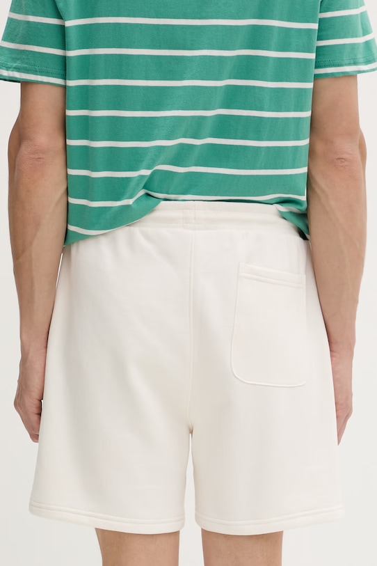 Odzież Tommy Jeans szorty dresowe męskie z bawełną DM0DM22697 beżowy