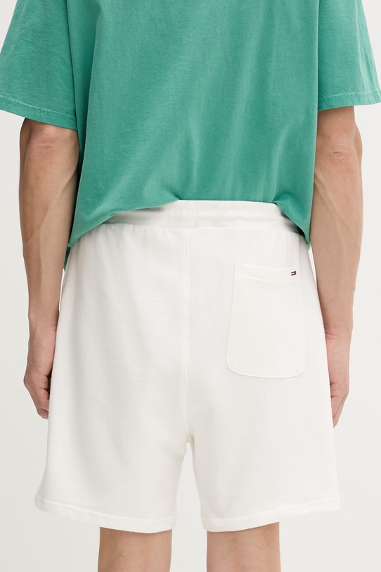 Odzież Tommy Jeans szorty dresowe męskie bawełniane DM0DM23017 beżowy