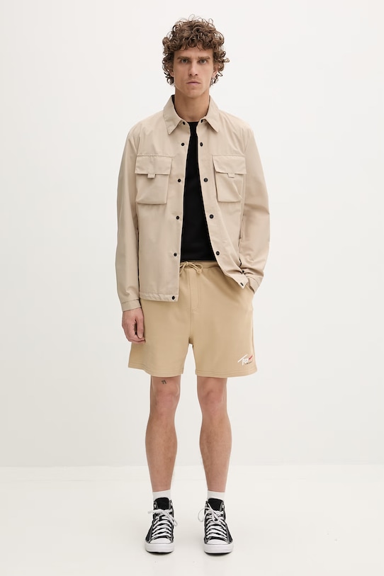 Tommy Jeans szorty dresowe męskie bawełniane DM0DM23017 beżowy SS26
