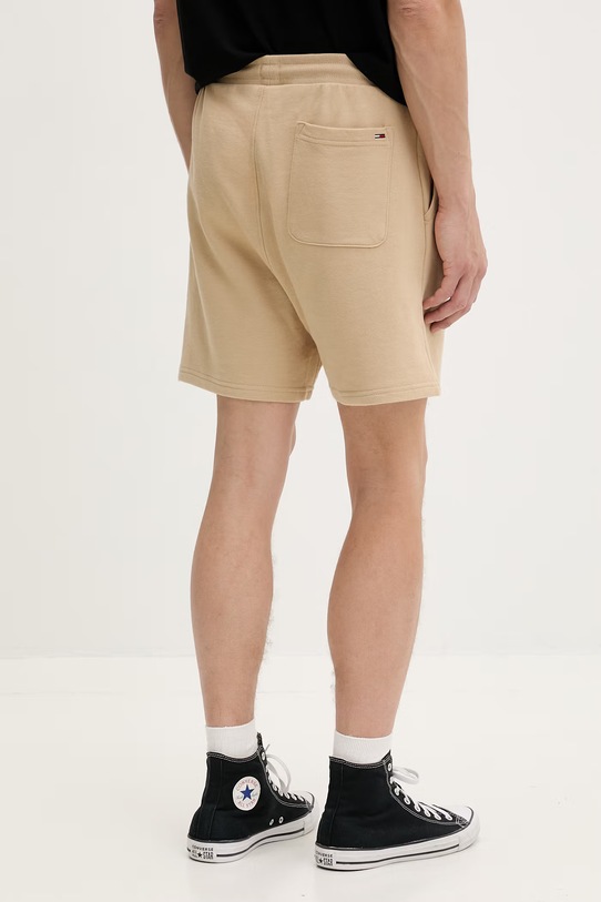 Odzież Tommy Jeans szorty dresowe męskie bawełniane DM0DM23017 beżowy