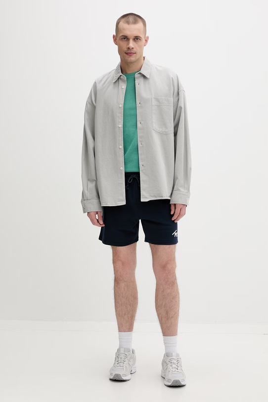 Tommy Jeans szorty dresowe męskie bawełniane DM0DM23017 granatowy SS26