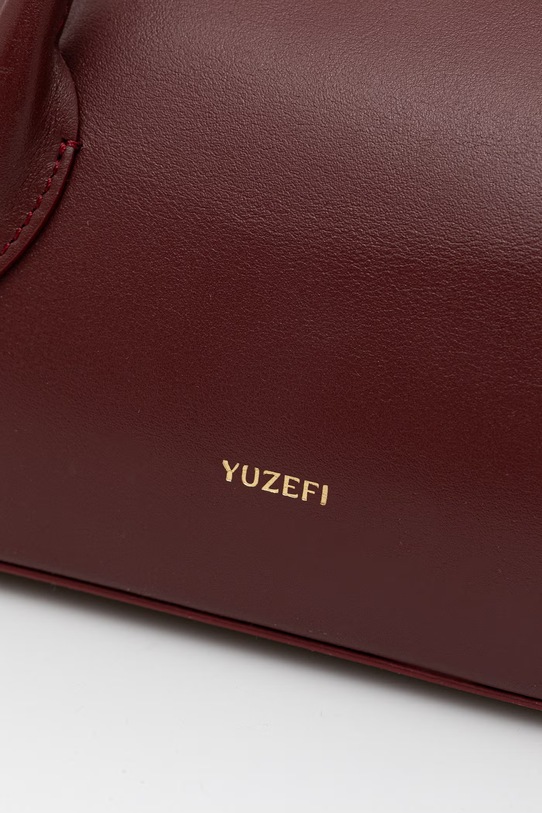 Yuzefi kabelka typu baguette dámska kožená OYSTER SHOULDER BAG MINI burgundské YUZSS26.HB.OSM.L071
