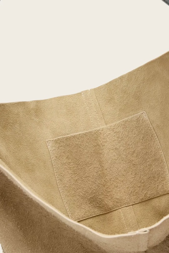 Semišová kabelka AllSaints ASHA W518XD béžová