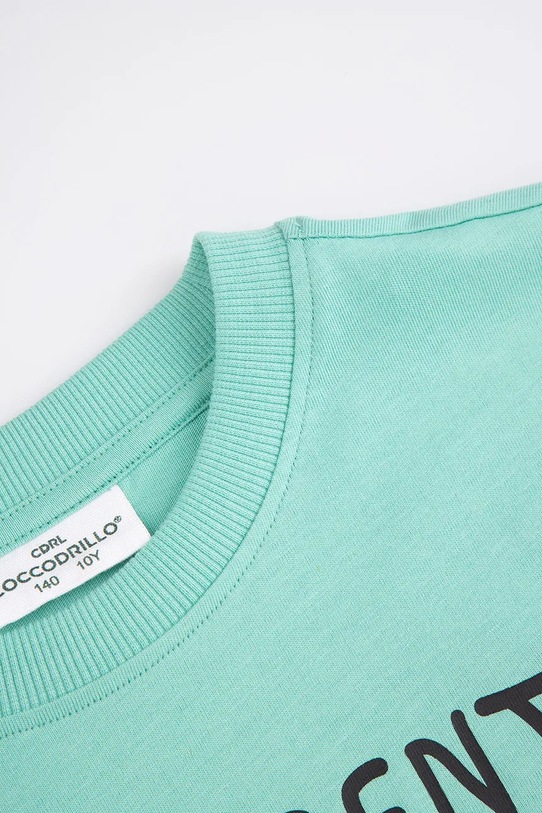 Момче Детска памучна тениска Coccodrillo WC6143210VBA зелен