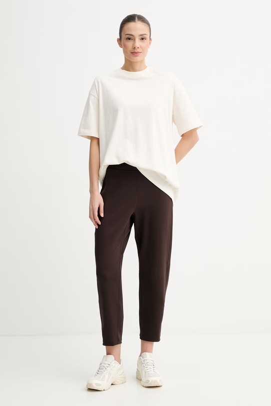 The North Face tričko ženské bavlněné Essential Simple Dome NF0A8EVXQLI1 béžová SS26