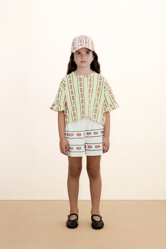 Tinycottons t-shirt bawełniany dziecięcy ROSE PATTERN CROP TEE wzorzyste żółty SS26.031