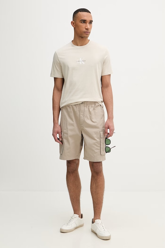 Calvin Klein Jeans tričko pánske bavlnené LV04RB866G béžová SS26