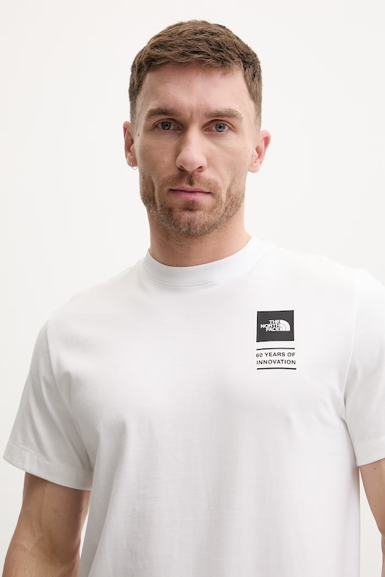 Βαμβακερό μπλουζάκι The North Face CELEBRATION λευκό NF0A8GAQFN41