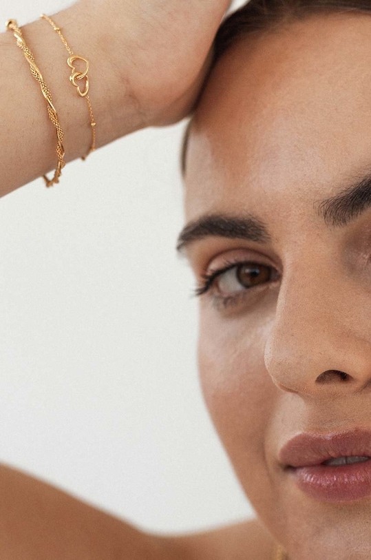 Kiegészítők ANIA KRUK aranyozott karkötő Trendy SLTAS2180Z arany