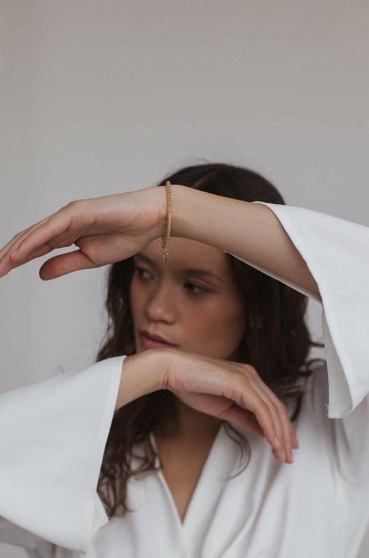 Αξεσουάρ Βραχιόλι από επιχρυσωμένο ασήμι ANIA KRUK OVAL SSIAS0570Z χρυσαφί