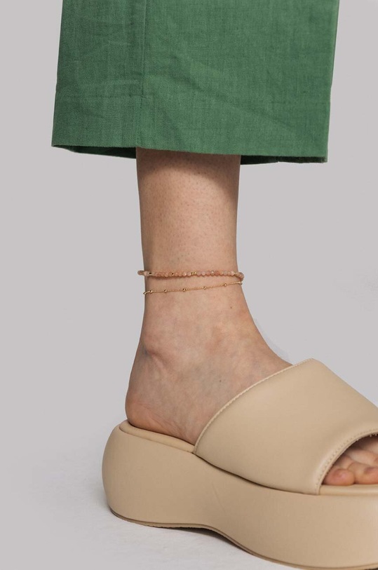 Pozlátený náramok na členok ANIA KRUK TRENDY zlatá SGCAS2780Z