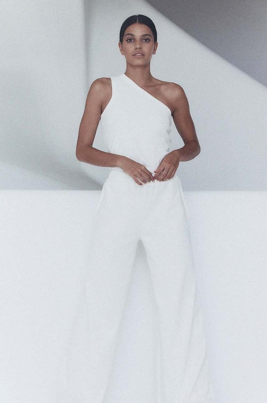 Top s příměsí vlny MUUV. SUIS asym.koszulka.SUIS bílá