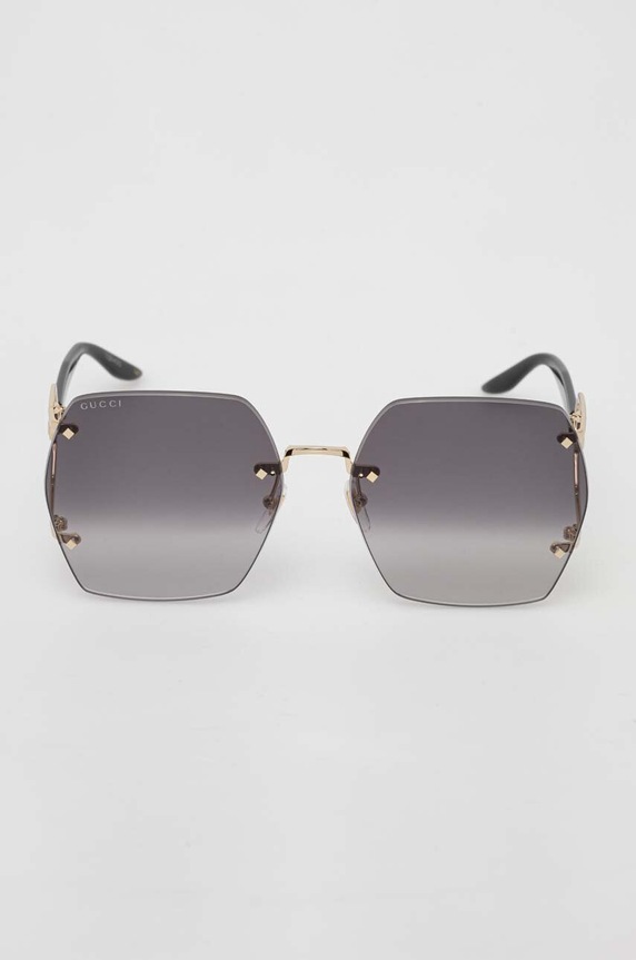 Akcesoria Gucci okulary przeciwsłoneczne GG1562S złoty