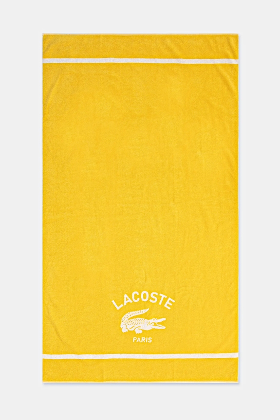 Bavlněný plážový ručník Lacoste LORIGINE Jaune 90 x 160 cm žlutá 1047044