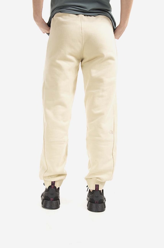 Odzież The North Face spodnie dresowe bawełniane Oversized Jogger NF0A5IGE beżowy