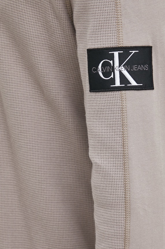 Bavlněné tričko s dlouhým rukávem Calvin Klein Jeans J30J321705.9BYY béžová