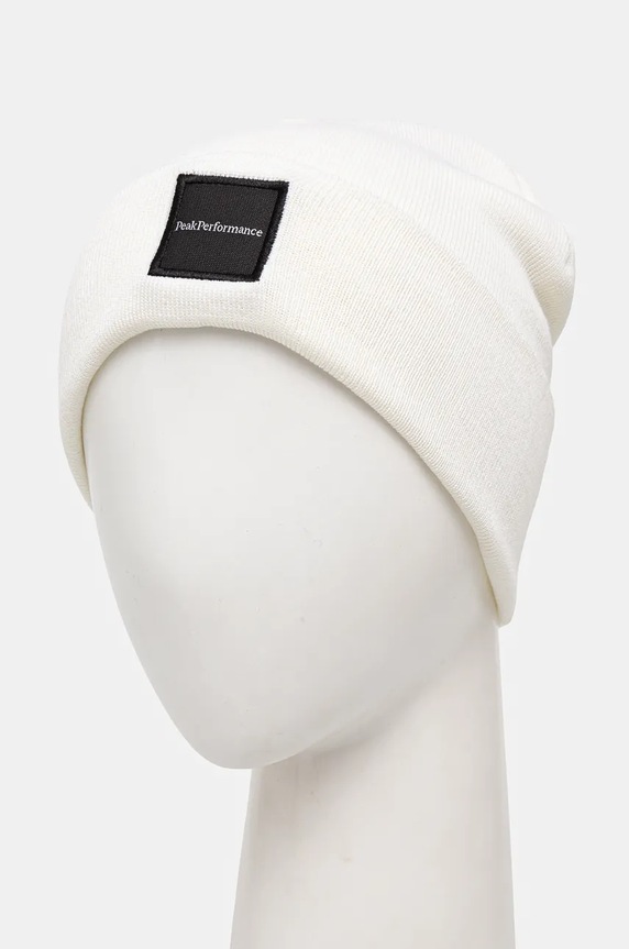 Kapa s dodatkom vune Peak Performance Switch G77781 bež AW25