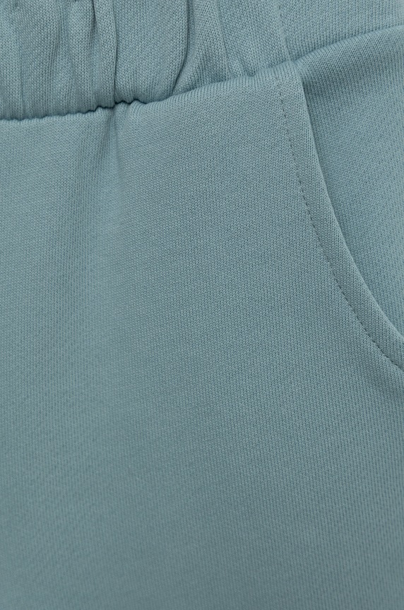 Dziewczynka United Colors of Benetton spodnie dresowe bawełniane dziecięce 3QLAGF015.P niebieski