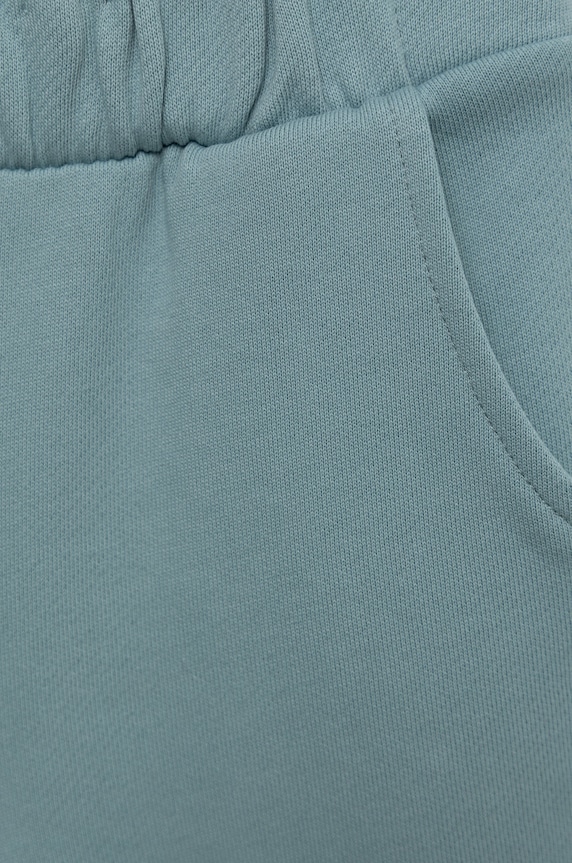 Dziewczynka United Colors of Benetton spodnie dresowe bawełniane dziecięce 3QLAGF015.P niebieski