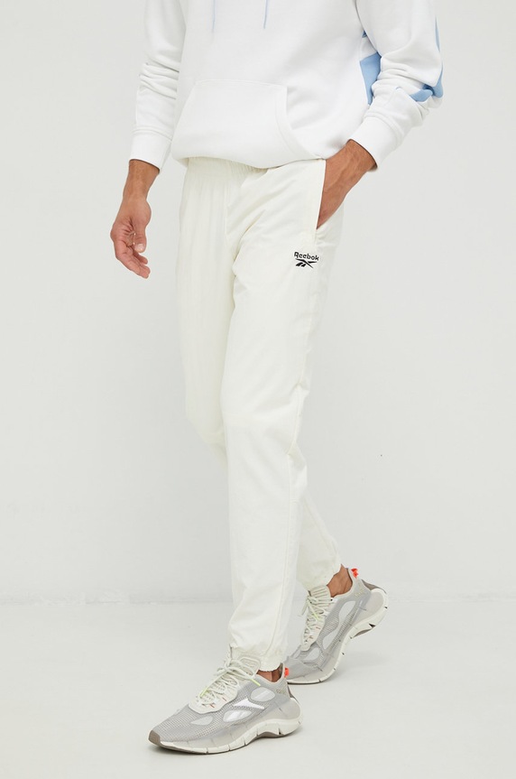 Tepláky Reebok Classic látka béžová HG1593