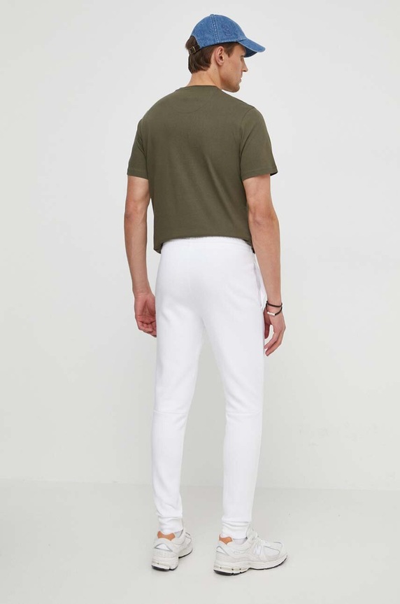 Odzież Lacoste spodnie dresowe męskie z bawełną XH9624 biały