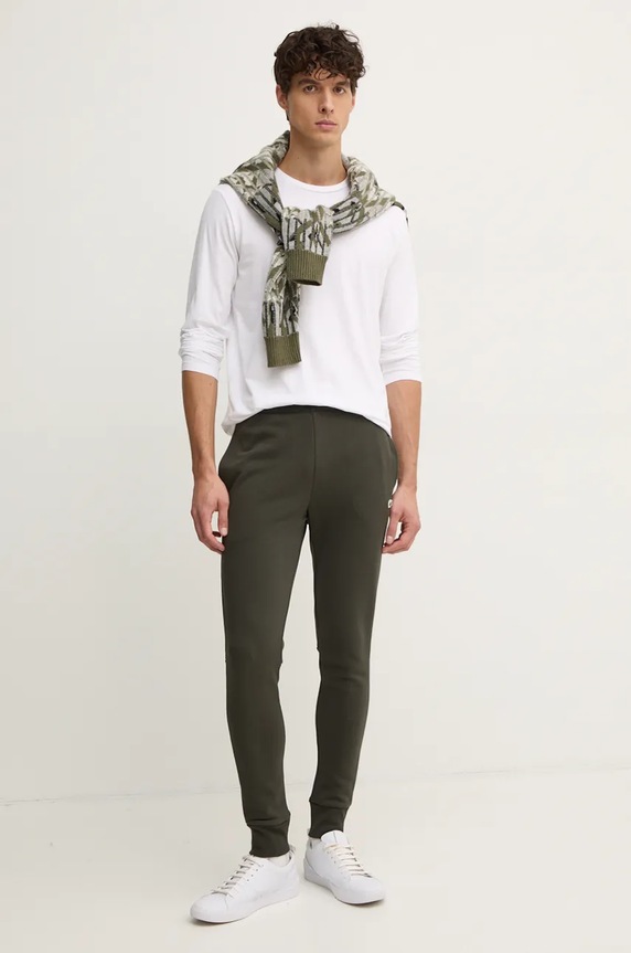 Lacoste spodnie dresowe męskie z bawełną XH9624 zielony SS26