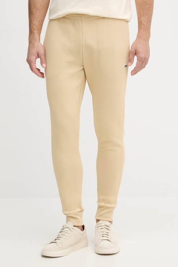 Lacoste spodnie dresowe męskie z bawełną beżowy XH9624