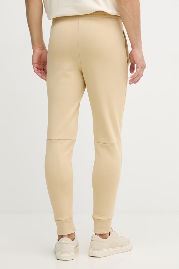 Odzież Lacoste spodnie dresowe męskie z bawełną XH9624 beżowy