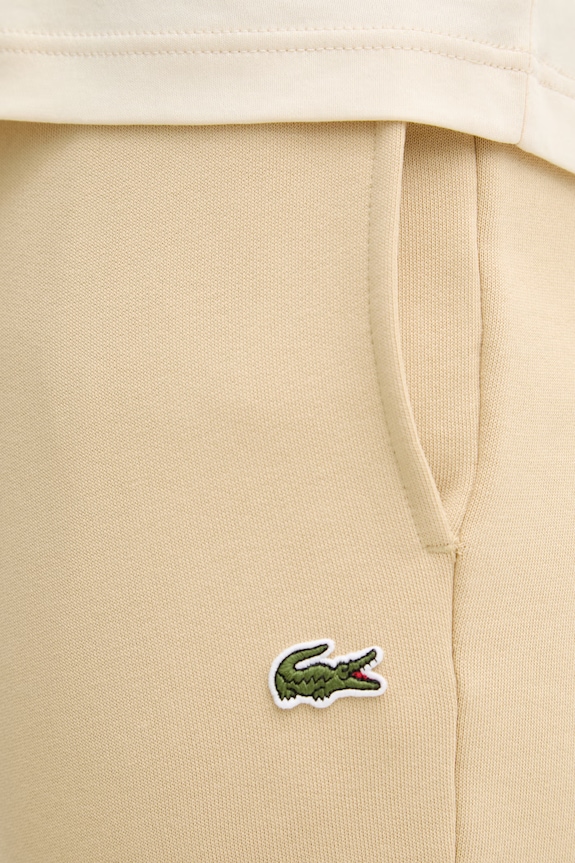 Lacoste spodnie dresowe męskie z bawełną beżowy XH9624