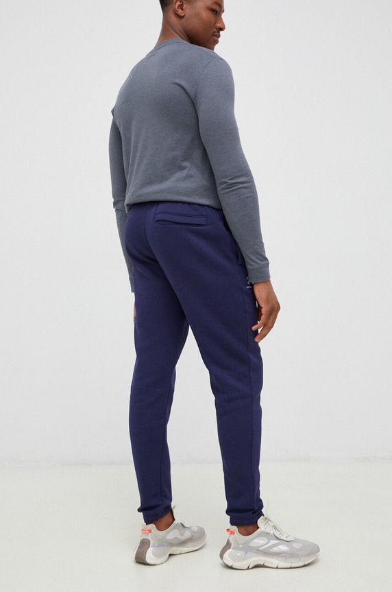 Ρούχα Παντελόνι φόρμας Under Armour 1373882 σκούρο μπλε