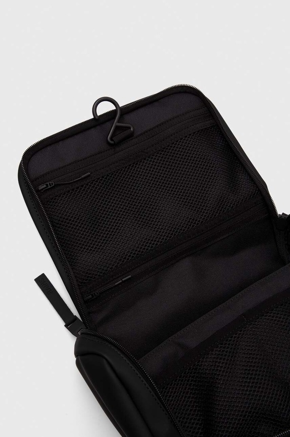 Kozmetička torbica Rains 16310 Travel Accessories crna 16310.01