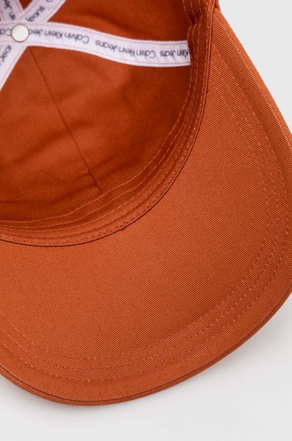 Bavlnená šiltovka Calvin Klein Jeans oranžová K50K510061