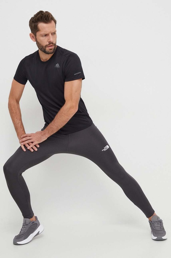 Športové legíny The North Face NF0A7SXN0C51 sivá AW23