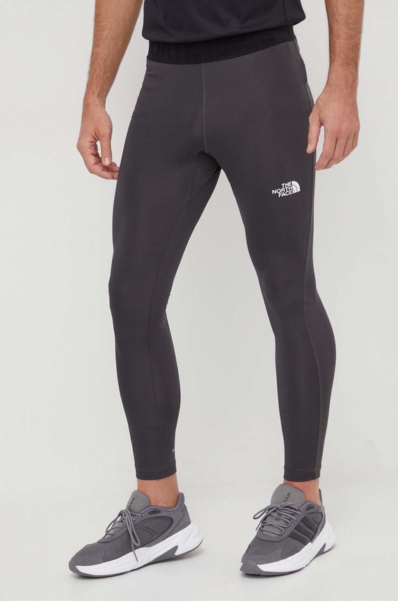 Oblečenie Športové legíny The North Face NF0A7SXN0C51 sivá