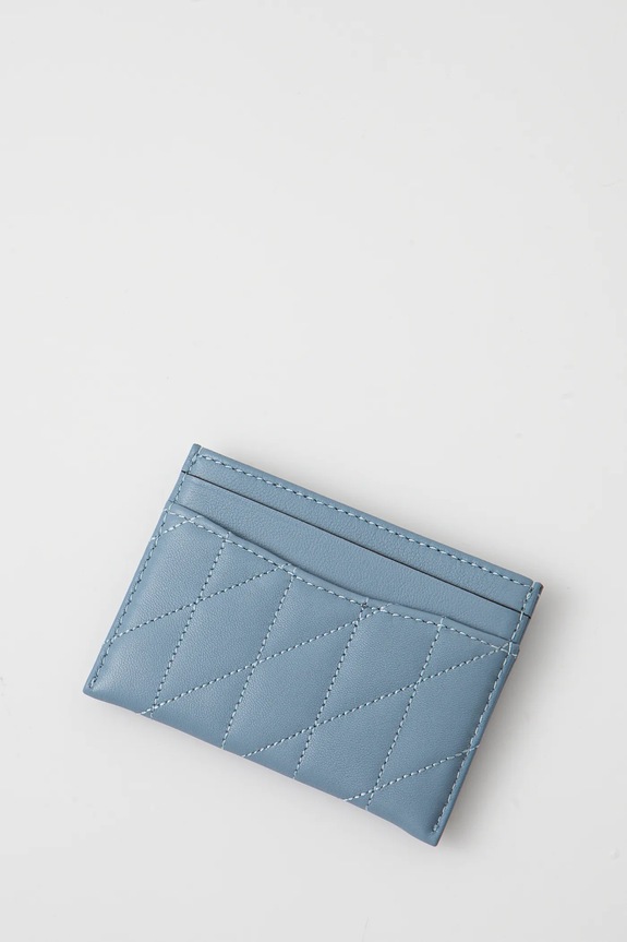 Kožené pouzdro na karty Coach Essential Card Case CM434 modrá SS26