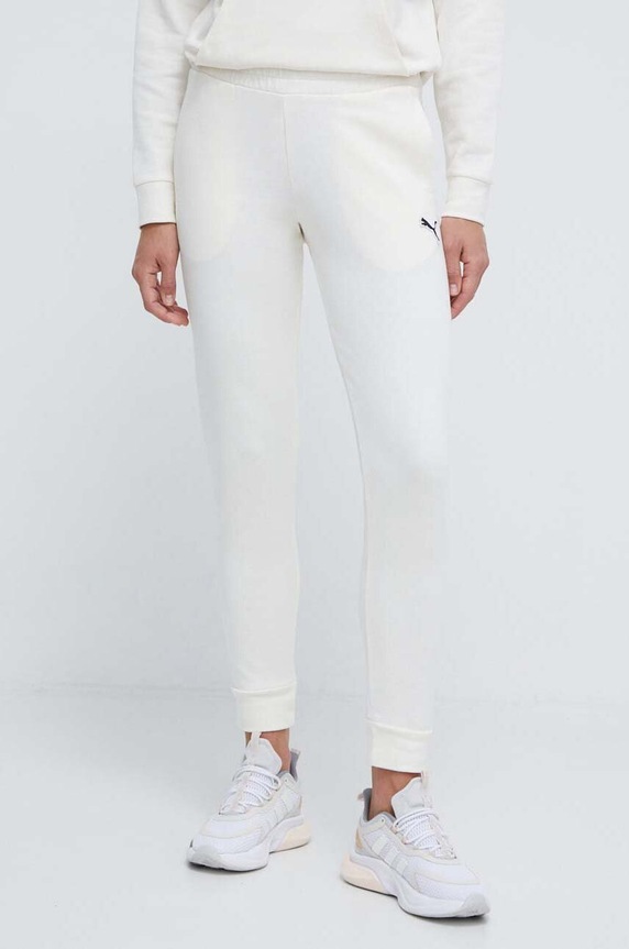 Puma spodnie dresowe bawełniane BETTER ESSENTIALS bawełna beżowy 675989