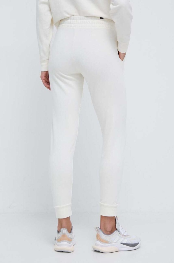 Odzież Puma spodnie dresowe bawełniane BETTER ESSENTIALS 675989 beżowy