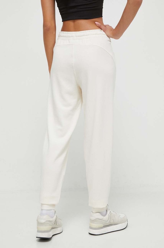 Îmbrăcăminte Puma pantaloni de trening 676069 bej