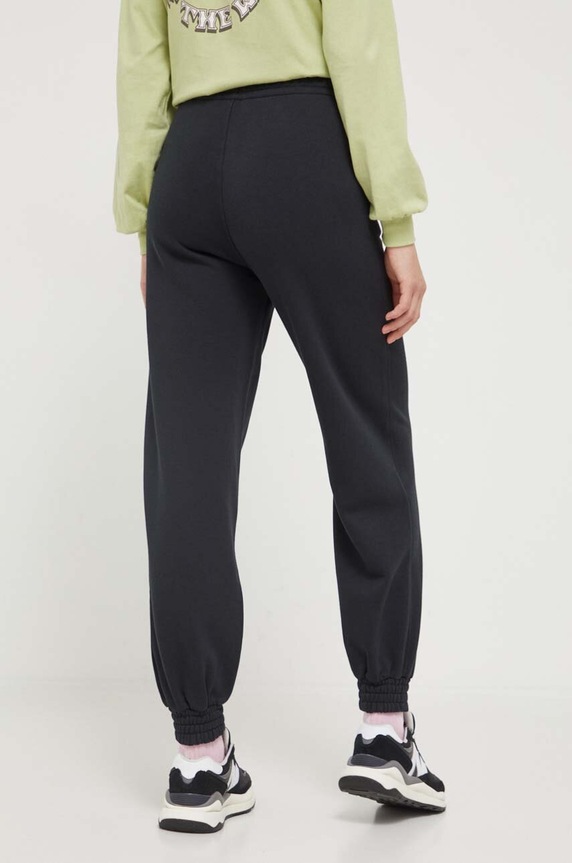 Odzież Converse spodnie dresowe 10025889.A01 czarny