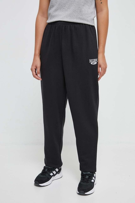 Pamučni donji dio trenirke Reebok Classic ARCHIVE ESSENTIALS bez uzorka crna 100036324